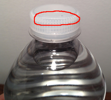 unsafe bottled water with damaged cap